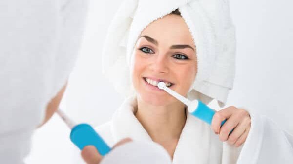 how often should I brush my teeth?